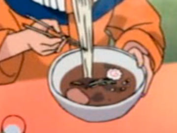 Naruto comiendo ramen, se puede ver el Narutomaki en su bol